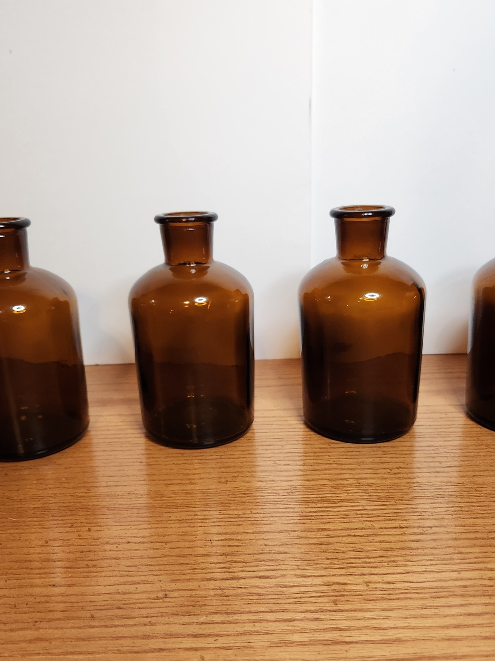 Dark Amber Glass Jars set of 4- 5" tall no stoppers .